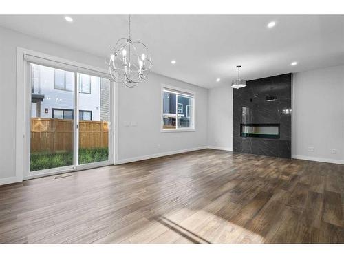 113 Amblehurst Rise Nw, Calgary, AB - Indoor Photo Showing Living Room