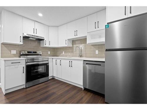 113 Amblehurst Rise Nw, Calgary, AB - Indoor Photo Showing Kitchen With Stainless Steel Kitchen