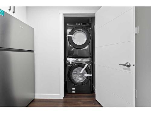 113 Amblehurst Rise Nw, Calgary, AB - Indoor Photo Showing Laundry Room