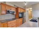 426-3111 34 Avenue Nw, Calgary, AB  - Indoor Photo Showing Kitchen With Double Sink 