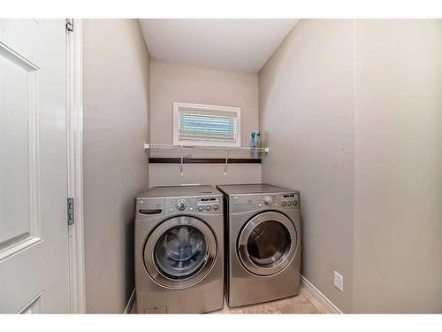 92 Silverado Skies Manor Sw, Calgary, AB - Indoor Photo Showing Laundry Room