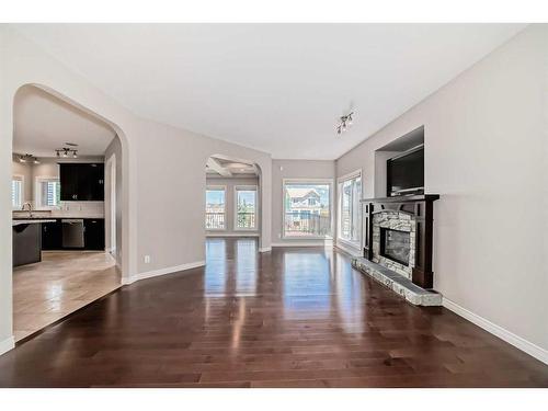 92 Silverado Skies Manor Sw, Calgary, AB - Indoor Photo Showing Living Room With Fireplace