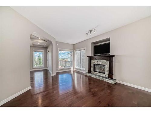 92 Silverado Skies Manor Sw, Calgary, AB - Indoor Photo Showing Living Room With Fireplace