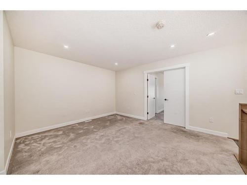 4834 87 Avenue Ne, Calgary, AB - Indoor Photo Showing Other Room With Fireplace