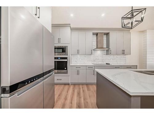 4834 87 Avenue Ne, Calgary, AB - Indoor Photo Showing Kitchen With Double Sink With Upgraded Kitchen