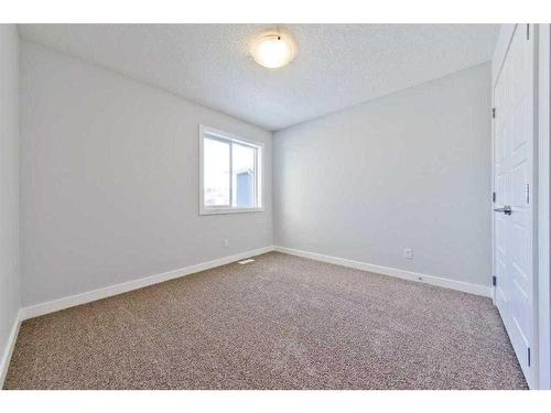 27 Versant View Sw, Calgary, AB - Indoor Photo Showing Other Room