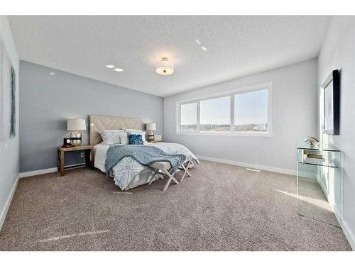 27 Versant View Sw, Calgary, AB - Indoor Photo Showing Bedroom