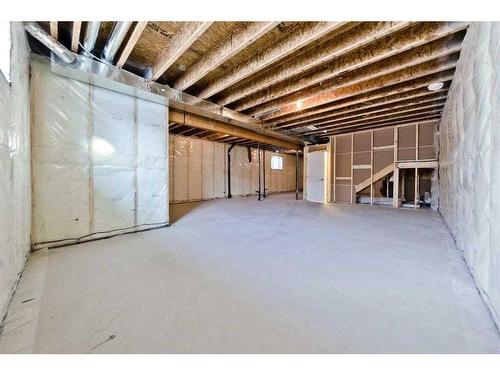 27 Versant View Sw, Calgary, AB - Indoor Photo Showing Basement