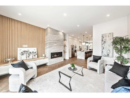 922 33A Street Nw, Calgary, AB - Indoor Photo Showing Living Room With Fireplace