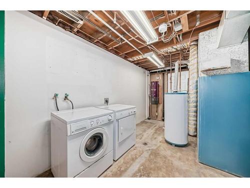 139 Abalone Way Ne, Calgary, AB - Indoor Photo Showing Laundry Room