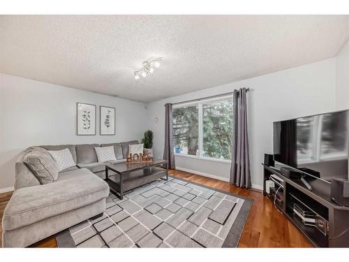 139 Abalone Way Ne, Calgary, AB - Indoor Photo Showing Living Room