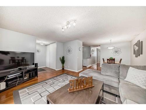 139 Abalone Way Ne, Calgary, AB - Indoor Photo Showing Living Room