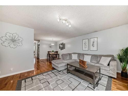 139 Abalone Way Ne, Calgary, AB - Indoor Photo Showing Living Room