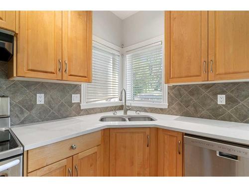 1565 Strathcona Drive Sw, Calgary, AB - Indoor Photo Showing Kitchen With Double Sink