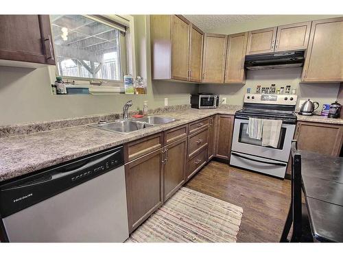 206 26 St Street, Cold Lake, AB - Indoor Photo Showing Kitchen With Double Sink