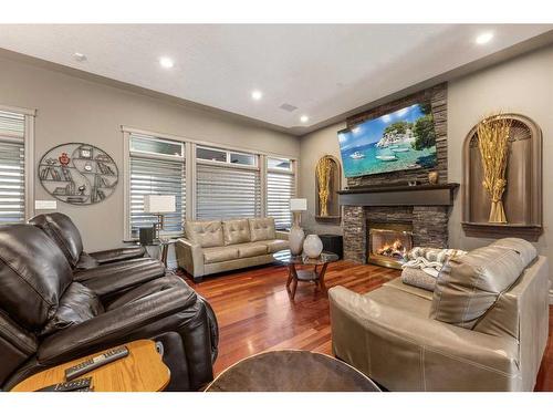 20 Lake Ridge, Olds, AB - Indoor Photo Showing Living Room With Fireplace