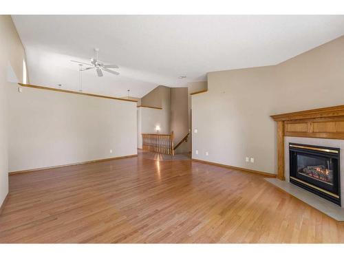 22 Douglasview Park Se, Calgary, AB - Indoor Photo Showing Living Room With Fireplace