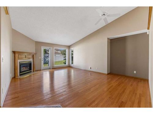 22 Douglasview Park Se, Calgary, AB - Indoor Photo Showing Living Room With Fireplace