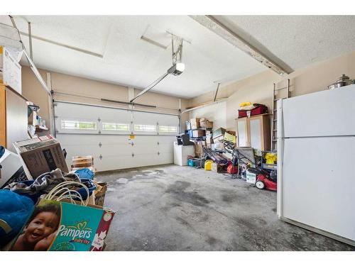 315 Hawkland Circle Nw, Calgary, AB - Indoor Photo Showing Garage