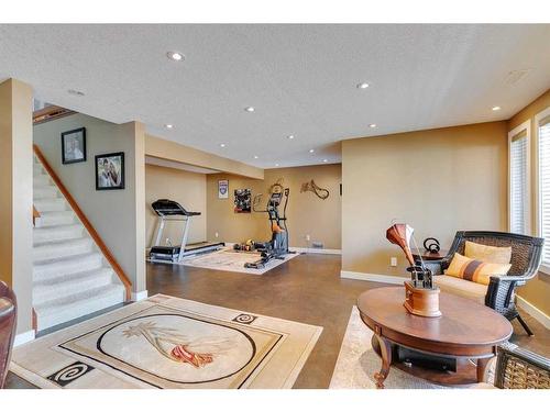 14 Cresthaven View Sw, Calgary, AB - Indoor Photo Showing Gym Room