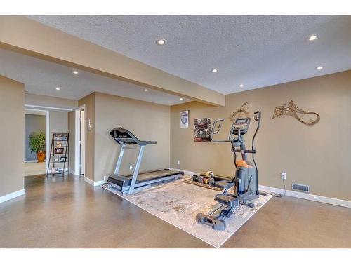 14 Cresthaven View Sw, Calgary, AB - Indoor Photo Showing Gym Room