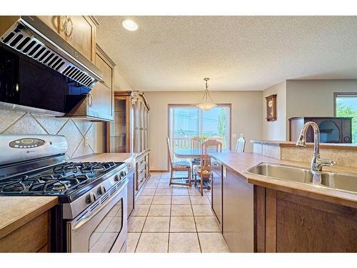 208 Tuscany Ridge Crescent Nw, Calgary, AB - Indoor Photo Showing Kitchen