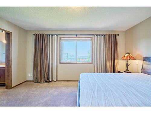 208 Tuscany Ridge Crescent Nw, Calgary, AB - Indoor Photo Showing Bedroom