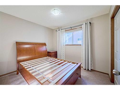 208 Tuscany Ridge Crescent Nw, Calgary, AB - Indoor Photo Showing Bedroom
