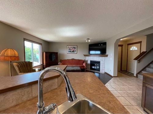 208 Tuscany Ridge Crescent Nw, Calgary, AB - Indoor With Fireplace