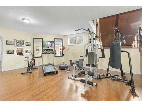 5 Elveden Point Sw, Calgary, AB - Indoor Photo Showing Gym Room