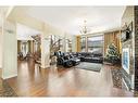 5 Elveden Point Sw, Calgary, AB  - Indoor Photo Showing Living Room With Fireplace 