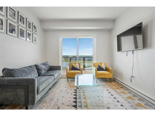 2306-42 Cranbrook Gardens Se, Calgary, AB - Indoor Photo Showing Living Room