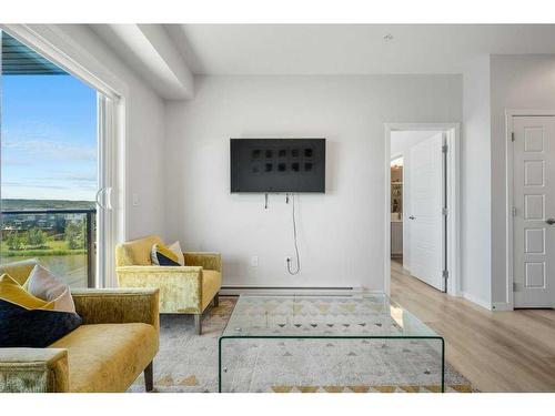 2306-42 Cranbrook Gardens Se, Calgary, AB - Indoor Photo Showing Living Room