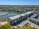 2306-42 Cranbrook Gardens Se, Calgary, AB  - Outdoor With Body Of Water With View 