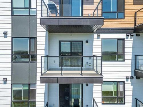 2306-42 Cranbrook Gardens Se, Calgary, AB - Outdoor With Balcony