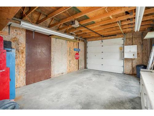 378 Arbour Grove Close Nw, Calgary, AB - Indoor Photo Showing Garage