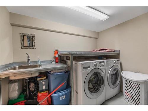 15 Beacham Way Nw, Calgary, AB - Indoor Photo Showing Laundry Room