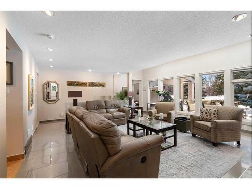 10931 Willowfern Drive Se, Calgary, AB - Indoor Photo Showing Living Room