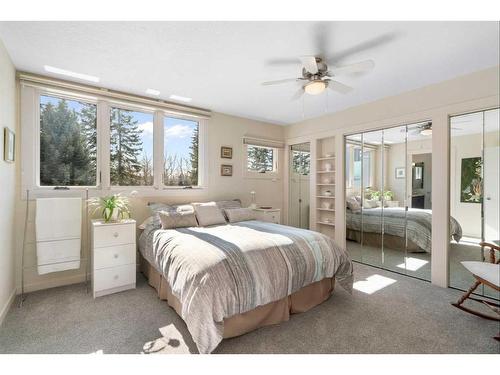 10931 Willowfern Drive Se, Calgary, AB - Indoor Photo Showing Bedroom