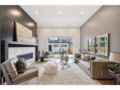 528 19 Avenue Sw, Calgary, AB - Indoor Photo Showing Living Room With Fireplace