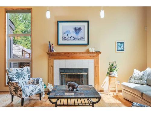 226 Hawkside Mews Nw, Calgary, AB - Indoor Photo Showing Living Room With Fireplace