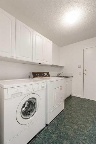 2002 Patterson View Sw, Calgary, AB - Indoor Photo Showing Laundry Room