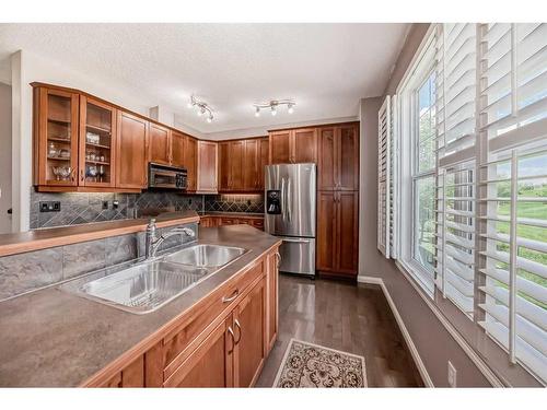 62 Discovery Heights Sw, Calgary, AB - Indoor Photo Showing Kitchen With Double Sink