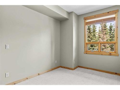 411-107 Armstrong Place, Canmore, AB - Indoor Photo Showing Other Room