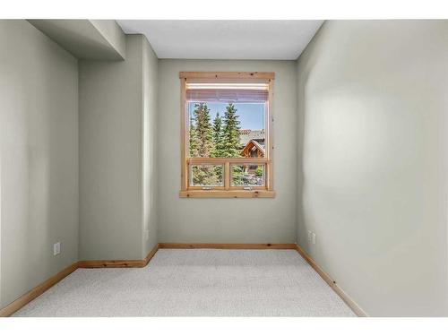 411-107 Armstrong Place, Canmore, AB - Indoor Photo Showing Other Room