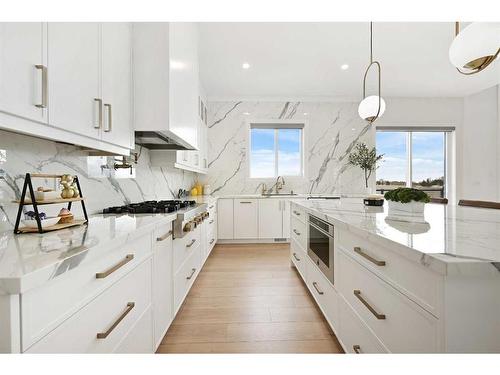 35 Windhorse Green, Rural Rocky View County, AB - Indoor Photo Showing Kitchen With Upgraded Kitchen