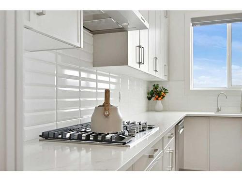 35 Windhorse Green, Rural Rocky View County, AB - Indoor Photo Showing Kitchen With Upgraded Kitchen