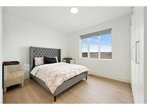 35 Windhorse Green, Rural Rocky View County, AB - Indoor Photo Showing Bedroom