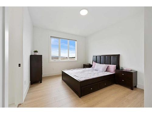 35 Windhorse Green, Rural Rocky View County, AB - Indoor Photo Showing Bedroom