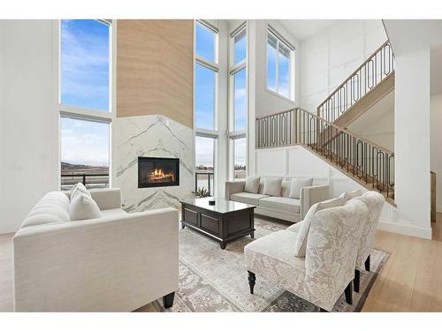 35 Windhorse Green, Rural Rocky View County, AB - Indoor Photo Showing Living Room With Fireplace